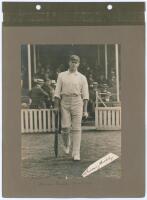 England v Australia. The Oval 1909. Early original photograph of Warren Bardsley walking out to bat for Australia. The photograph measures 6.25”x8.5”, laid to photograph album page with handwritten caption in ink below. Ink signature of Bardsley on piece 