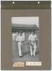 Yorkshire and Middlesex 1911. Two early mono photographs of Yorkshire and Middlesex players, walking on to the field of play. The photographs are laid down individually back to back on a photograph album page with &lsquo;1911&rsquo; and players&rsquo; names annotated in in