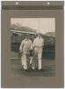 ‘Sussex 1911’. Early mono photograph of Ernest ‘Tim’ Killick and George Cox walking out to bat for Sussex in 1911. The photograph laid down to a photograph album page with handwritten title and names annotated in ink to margins, and signature in ink of Ki - 4