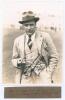 Vallance William Crisp Jupp. Sussex, Northamptonshire & England 1909-1938. Original sepia photograph of Jupp, half length wearing suit and trilby hat, cigarette in hand, at Scarborough for the match played 5th- 7th September 1928, in which Jupp played for