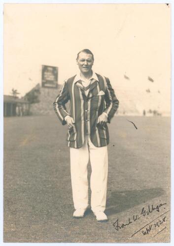 Frank William Gilligan. Oxford University & Essex 1919-1929. Original sepia photograph of Gilligan depicted full length wearing cricket attire and striped blazer at Scarborough with the scoreboard and grandstand in the background. Gilligan was playing for
