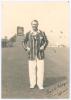 Frank William Gilligan. Oxford University & Essex 1919-1929. Original sepia photograph of Gilligan depicted full length wearing cricket attire and striped blazer at Scarborough with the scoreboard and grandstand in the background. Gilligan was playing for