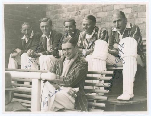 M.C.C. v Yorkshire, Scarborough 1930. Nice original mono photograph of six members of the M.C.C. team seated on benches on the pavilion steps for the match played 3rd- 5th September 1930. Very nicely signed in ink to the photograph by five of the players.