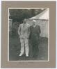 H.D.G. Leveson-Gower and George Kemp-Welch, Scarborough 1931. Original mono photograph of Leveson-Gower wearing a suit standing alongside George Kemp-Welch wearing cricket attire and (Cambridge University?) blazer. The two depicted full length with a marq