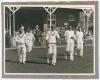 ‘Mr. H.D.G. Leveson-Gower’s XI v All India XI. Scarborough Sept. 1932’. Original mono photograph of the Leveson-Gower team lined up with the pavilion and stand with spectators in the background for the match played 7th- 9th September 1932. Nicely signed i - 2