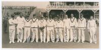 Yorkshire v M.C.C. Scarborough 1934. Original mono photograph of the M.C.C. team lined up at Scarborough, the pavilion and stand with spectators in the background, for the match played 1st -4th September 1934. Very nicely signed to the photograph by ten o