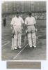 Hopper Levett and Denys Wilcox. Yorkshire v. M.C.C. Scarborough 1937. Original mono photograph of the M.C.C. opening batsmen, Levett and Wilcox, standing full length at the wicket, presumably at the start of play, the packed stand in the background, for t