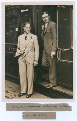 Herbert Sutcliffe. Yorkshire & England 1919-1945. Original sepia press photograph of Sutcliffe and Walter Hammond both wearing suits, standing at the door of a train at St. Pancras Station prior to travelling to Australia for the 1932/33 &lsquo;Bodyline&rsquo; tour. 