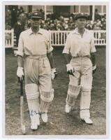 Australia tour to England 1934. Large original sepia press photograph of Bill Woodfull and Bill Brown walking out to bat for Australia in the 2nd Test, Lord’s 22nd- 25th June 1934. The photograph very nicely signed in ink by both Woodfull and Brown. Sport