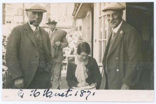 George Herbert Hirst. Yorkshire & England 1891-1929. Original sepia real photograph postcard of Hirst wearing suit and flat cap, celebrating his 57th birthday with friends at Scarborough in 1928. Signed in ink to the lower front border ‘G.H. Hirst 1871’, 