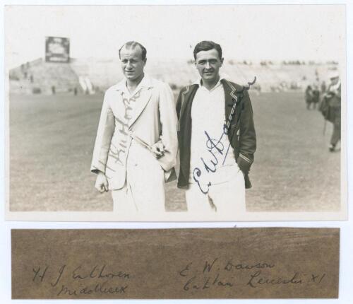 Tom Enthoven and Eddie Dawson. Scarborough 1929. Original mono real photograph plain back postcard of Enthoven and Dawson standing three quarter length on the outfield at Scarborough, wearing cricket attire and blazers. Signed in ink to the photograph by 