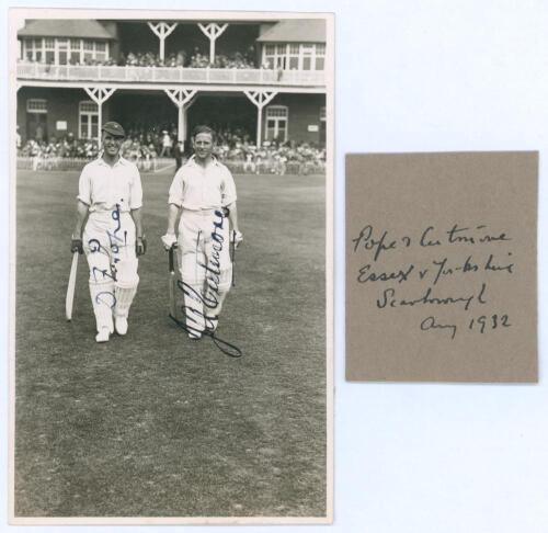 ‘Pope & Cutmore. Essex v Yorkshire, Scarborough Aug 1932’. Original mono real photograph postcard of Essex openers Dudley Pope and Jimmy Cutmore walking out to bat at Scarborough for Essex in the match v Yorkshire, 10th- 12th August 1932. Nicely signed in