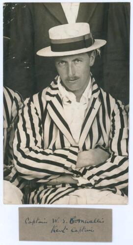 Wykeham Stanley Cornwallis. Kent 1919-1926. Original sepia press photograph of Cornwallis seated half length wearing striped blazer and straw boater. The photograph by Sport & General measures 3.75&rdquo;x6&rdquo;. Includes a trimmed handwritten caption from the orig