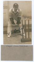 Walter Latter ‘Tich’ Cornford. Sussex & England 1921-1947. Original sepia press photograph of Cornford, full length in wicket-keeping pose wearing Sussex cap in indoor nets. Beautifully signed in black ink to the photograph by Cornford. The photograph by 