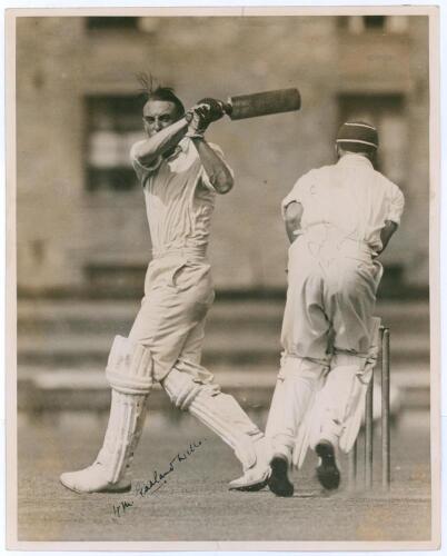 Herbert Montandon Garland-Wells. Oxford University & Surrey 1927-1939. Large original sepia photograph of Garland-Wells in batting action c.1932, match unknown. Nicely signed in black ink to the photograph by Garland-Wells. Photo by Central News. 8&rdquo;x10&rdquo;. 