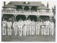 Derbyshire v Yorkshire. Scarborough 1937. Original mono photograph of the Derbyshire team standing in one row in front of the pavilion at Scarborough for the match played 14th & 15th August 1935. The photograph is nicely signed in ink by all eleven member