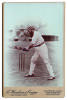 William Gilbert Grace, Gloucestershire, London County & England 1870-1908. Original sepia cabinet card photograph of Grace, wearing a hooped cap, playing a shot at the wicket. Photograph by E. Hawkins of Brighton. Photographers name and address printed to