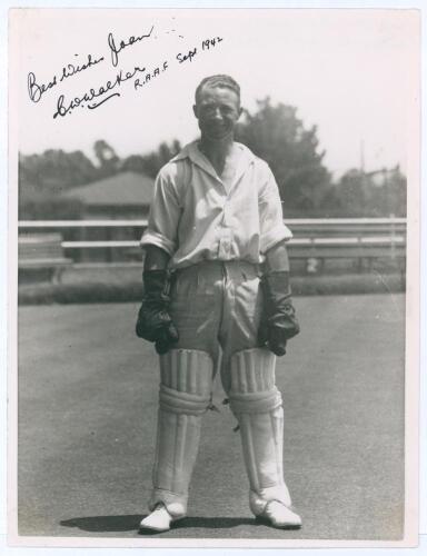 Charles William Walker. South Australia & Australia 1928-1941. Excellent mono press photograph of Walker in wicket keeping pose in 1942. Nicely signed in ink &lsquo;Best Wishes Joan. C.W. Walker. R.A.A.F. Sept 1942&rsquo;. Photograph stamped to back &lsquo;Photos Ltd, Lond