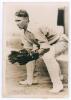 Charles William Walker. South Australia & Australia 1928-1941. Excellent mono press photograph of Walker in wicket keeping pose in 1942. Nicely signed in ink &lsquo;Best Wishes Joan. C.W. Walker. R.A.A.F. Sept 1942&rsquo;. Photograph stamped to back &lsquo;Photos Ltd, Lond - 2