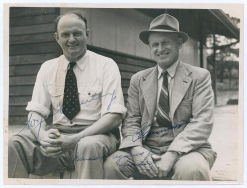 William Joseph &lsquo;Bill&rsquo; O&rsquo;Reilly. New South Wales & Australia 1927-1946 and Clarence &lsquo;Clarrie&rsquo; Victor Grimmett. Victoria, South Australia & Australia 1918-1941. Excellent informal mono press photograph of the two Australian Test players sitting in front of 