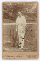 Kenneth Lotherington Hutchings. Kent & England 1902-1912. Original sepia cabinet card photograph of Hutchings, full length in batting attire, stood at the wicket leaning on his bat. Signed in black ink to the image by Hutchings. Name printed to lower edge