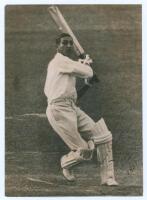 Iftikhar Ali Khan, Nawab of Pataudi. Oxford University, Worcestershire, England & India 1928-1948. Original mono press photograph of the Nawab of Pataudi in batting action playing a pull shot. Signed and dated to the image &lsquo;Yours sincerely, Pataudi 1937&rsquo;.