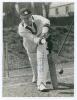 Charles Henry Palmer. Worcestershire, Europeans, Leicestershire, & England 1938-1959. Original mono press photograph of Palmer, full length, playing a forward defensive shot in the nets. Nicely signed in blue ink to the photograph by Palmer. Leicester Mer