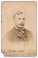 Charles William Alcock. Cricket and football administrator. Original sepia cabinet card of Alcock, head and shoulder in cameo, wearing formal attire. Photograph by E. Hawkins & Co, Brighton with printed name to lower border and to verso. Signed to lower b