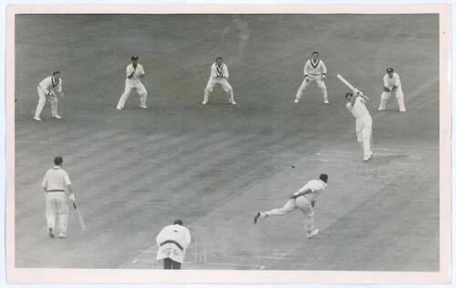 Australian tour to England 1961. Two original mono press photographs from the 1961 tour. Surrey v Australians, The Oval, 13th- 16th May 1961. Peter May plays a straight drive off the bowling of Alan Davidson with the slip cordon of Grout, Simpson, Benaud,