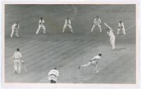 Australian tour to England 1961. Two original mono press photographs from the 1961 tour. Surrey v Australians, The Oval, 13th- 16th May 1961. Peter May plays a straight drive off the bowling of Alan Davidson with the slip cordon of Grout, Simpson, Benaud,