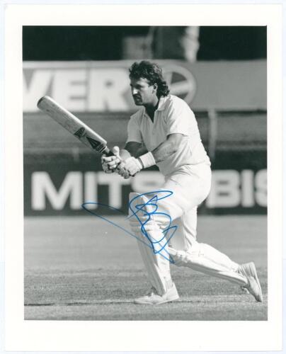 Ian Botham. Sheffield Shield 1987/88. Original mono press photograph of Botham in batting action for Queensland in the match v South Australia at Brisbane, February 1988. Nicely signed to the photograph by Botham. All-Sport Photographic, London. 8&rdquo;x10&rdquo;. V