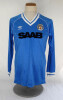 Ian Botham. Manchester City football shirt worn by Ian Botham in a Charity match in the early 1980&rsquo;s. The long sleeved light blue, with white trim to neck and cuffs, Umbro shirt with Manchester City emblem and shirt sponsor &lsquo;SAAB&rsquo; to chest. Number &lsquo;9&rsquo; to 