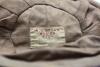 Sussex navy blue 2nd XI cloth cricket cap worn by Robin Marlar during his playing career. The cap, by W.V. Brown of Eton, embroidered with the single martlet emblem of Sussex to front. The cap is worn and a little faded, with odd faults, odd moth hole etc - 2
