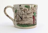 Village cricket mug. Staffordshire 19th century mug, transfer printed in black with two scenes of village cricket, with church and tents to background, floral and oak leaf rim decoration and crossed cricket bats, balls and stumps decoration to handle. Han