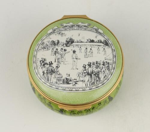 &lsquo;Cricket at Lord&rsquo;s&rsquo;. Halcyon Days circular enamelled pill box. The lid with scene of Lord&rsquo;s at the beginning of the 19th Century, the hinged lid revealing title &lsquo;Cricket at Lord&rsquo;s in the early 19th Century&rsquo; and small vignette of a cricketer in top hat. T