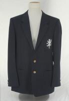 Ian Terence Botham. Somerset navy blue blazer worn by Ian Botham during his playing career with the club. The blazer by &lsquo;Van Heusen of Saville Row&rsquo; with embroidered white Somerset dragon with red tongue emblem applied to blazer breast pocket. Sold with a