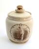 Kumar Shri Ranjitsinhji. Sussex & England 1895-1920. A Victorian stoneware cream coloured tobacco jar and cover with a sepia transfer printed full length image of Ranjitsinhji in batting pose at the wicket with name &lsquo;K.S. Ranjitsinhji&rsquo; below. To base &lsquo;A.O