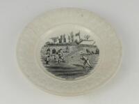 Victorian cricket plate. A 19th Century Staffordshire plate with transfer printed decoration centre of a cricket match in progress in black, with tents, a flag, church and large crowd to the background. Title &lsquo;Cricket&rsquo; printed to lower edge under the imag