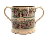 Victorian cricket loving cup. An extraordinarily large 19th century Staffordshire loving cup with double transfer printed decoration in to either side of a cricket match in progress, with tents and church to the background with some hand colouring in red,