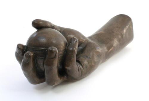W.G. Grace. An unusual and rarely seen life size bronze hand of Grace holding a cricket ball. The stump of the arm impressed with Grace&rsquo;s signature. The hand and arm measure approximately 11" long.