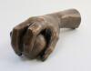W.G. Grace. An unusual and rarely seen life size bronze hand of Grace holding a cricket ball. The stump of the arm impressed with Grace&rsquo;s signature. The hand and arm measure approximately 11" long. - 2