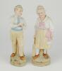 &lsquo;Young England and Young England&rsquo;s sister&rsquo;. A pair of continental bisque figures of a boy, wearing hooped cap holding a cricket ball and a young girl, also wearing a hooped cap, dressed in three-quarter dress holding a cricket bat, both on naturalistic ba
