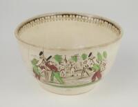 Village cricket bowl. Staffordshire 19th century bowl, transfer printed in sepia with three scenes of village cricket, with church and tents to background, to sides, floral and oak leaf inner rim decoration. Hand coloured in green, burgundy and black. App