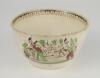 Village cricket bowl. Staffordshire 19th century bowl, transfer printed in sepia with three scenes of village cricket, with church and tents to background, to sides, floral and oak leaf inner rim decoration. Hand coloured in green, burgundy and black. App