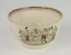 Village cricket bowl. Staffordshire 19th century bowl, transfer printed in sepia with three scenes of village cricket, with church and tents to background, to sides, floral and oak leaf inner rim decoration. Hand coloured in green, burgundy and black. App - 2