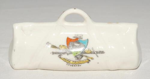 Cricket bags. Four large crested china cricket bags with colour emblems for &lsquo;Coventry&rsquo;, &lsquo;Leeds&rsquo;, Southampton&rsquo; and &lsquo;West Kirby&rsquo;. Each Approx 4.25&rdquo; long. Plus a medium cricket bag for &lsquo;Great Yarmouth&rsquo;. Various makers. Qty 5. G