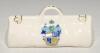 Cricket bags. Five very large crested china cricket bags with colour emblems for &lsquo;Bournemouth&rsquo;, &lsquo;Chesham&rsquo;, &lsquo;Newcastle-on-Tyne&rsquo;, &lsquo;Woolwich&rsquo; and &lsquo;Santa Cruz de Tenerife&rsquo;. Various makers. Each approx 4.5&rdquo; long. G