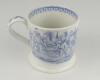 Village cricket mug. Staffordshire 19th century mug, transfer printed in pale blue with two scenes of village cricket to either side, with church and tents to background, floral and oak leaf rim decoration and crossed cricket bats, balls and stumps decora - 2