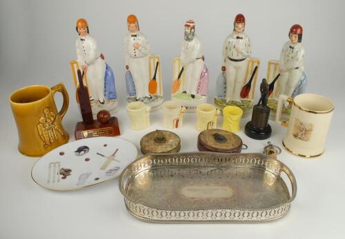 Cricket ceramics and metalware. A selection including reproduction Staffordshire figures (five including Grace), four childs cricket egg cups, two cricket mugs (1950/60&rsquo;s) including Arthur Wood series, a cricket plate, two cricket bottle stops, a silver p