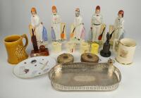 Cricket ceramics and metalware. A selection including reproduction Staffordshire figures (five including Grace), four childs cricket egg cups, two cricket mugs (1950/60’s) including Arthur Wood series, a cricket plate, two cricket bottle stops, a silver p